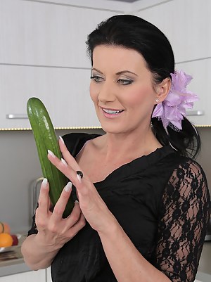32 year old Olivia from AllOver30 gets intimate with a long cucumber