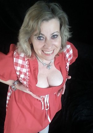 in Germany begins again theHorny German Dirndl time where  the big tits  swell out from the deep neckline and makes men