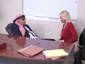 This blonde is incredibly loose with her morals and she doesn't mind fucking a Middle-Eastern dude just to make more money overseas.