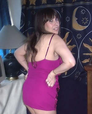 here i am wearing one of my favorite purple dresses..i had just startedto shave my lil kitty and this shows me with all